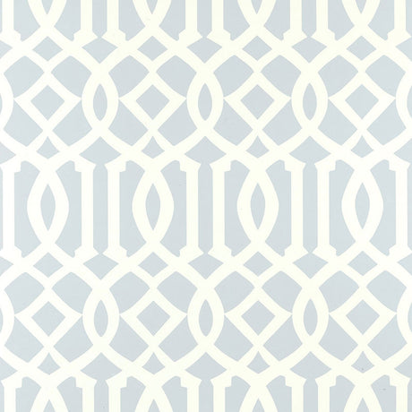 Imperial Trellis Soft Aqua by Kelly Wearstler for Schumacher - geometric trellis pattern wallpaper in a serene blue and white colorway, styled in a bedroom interior.