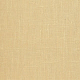 Close-up of Schumacher Adhafera Ground straw-colored handcrafted wallcovering with natural woven texture
