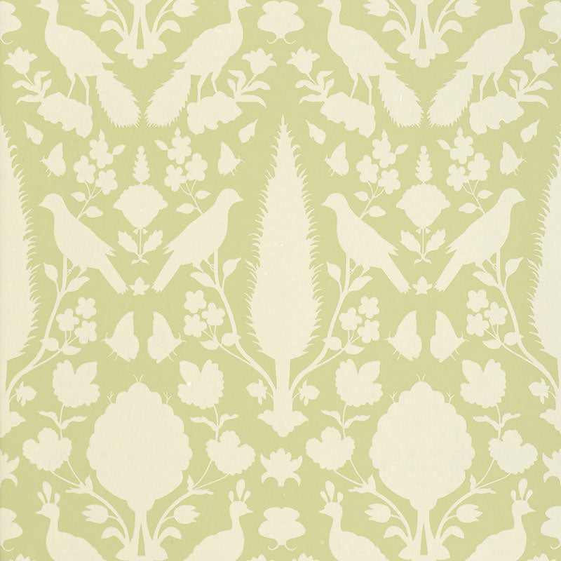 Chenonceau Sage wallpaper by Schumacher featuring enchanting flora and fauna silhouettes in a damask-inspired pattern.