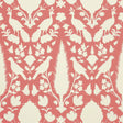 Chenonceau Coral wallpaper by Schumacher featuring a 17th-century Persian damask-inspired design with flora and fauna silhouettes in coral and white.