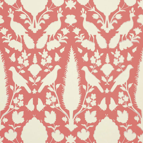 Chenonceau Coral wallpaper by Schumacher featuring a 17th-century Persian damask-inspired design with flora and fauna silhouettes in coral and white.
