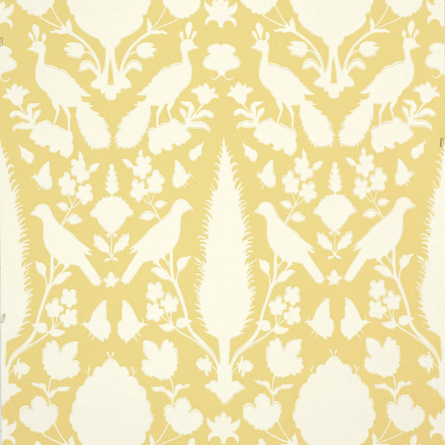 Chenonceau Buttercup wallpaper by Schumacher featuring a Persian damask-inspired pattern with birds and flora in yellow and white.