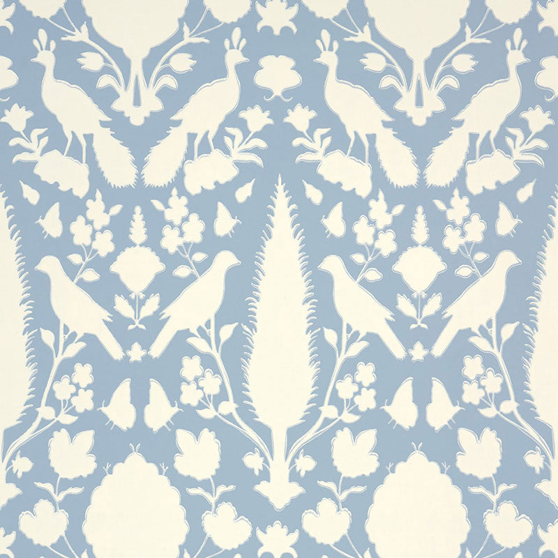 Chenonceau Sky wallpaper by Schumacher featuring a blue and white damask pattern with birds and flora.