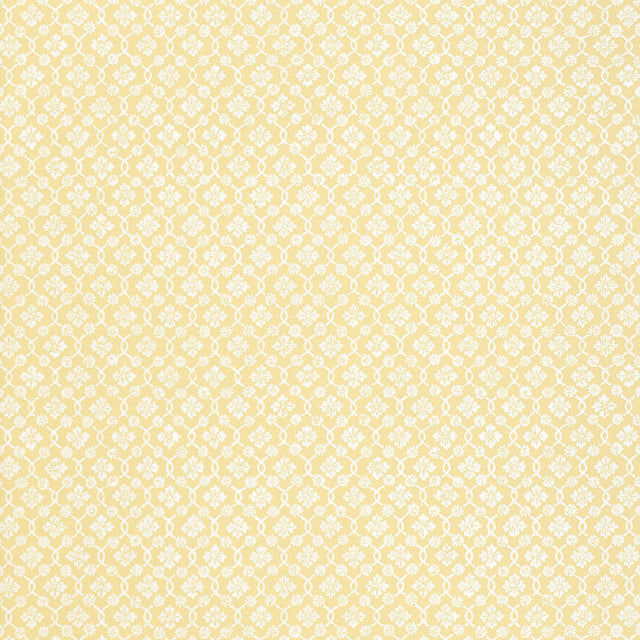 Harbury Trellis wallpaper in Buttercup by Schumacher features a delicate floral and lattice pattern in yellow and white.