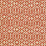 Harbury Trellis wallpaper in coral by Schumacher, featuring a delicate floral and lattice pattern.