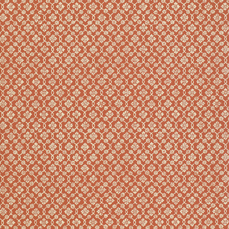 Harbury Trellis wallpaper in coral by Schumacher, featuring a delicate floral and lattice pattern.