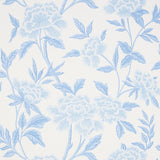Whitney Floral wallpaper in blue by Schumacher, featuring large-scale Chinoiserie-inspired blossoms and delicate dot details.
