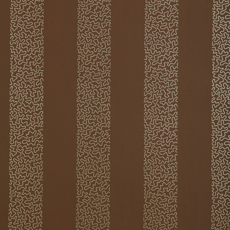 Beekman Stripe wallpaper in Truffle by Schumacher, designed by Matthew Patrick Smyth. Brown ground with abstract squiggle vertical stripes.