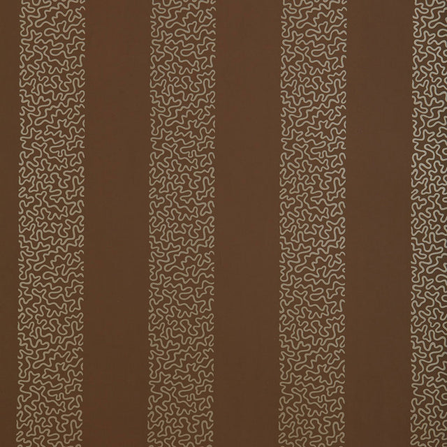 Beekman Stripe wallpaper in Truffle by Schumacher, designed by Matthew Patrick Smyth. Brown ground with abstract squiggle vertical stripes.