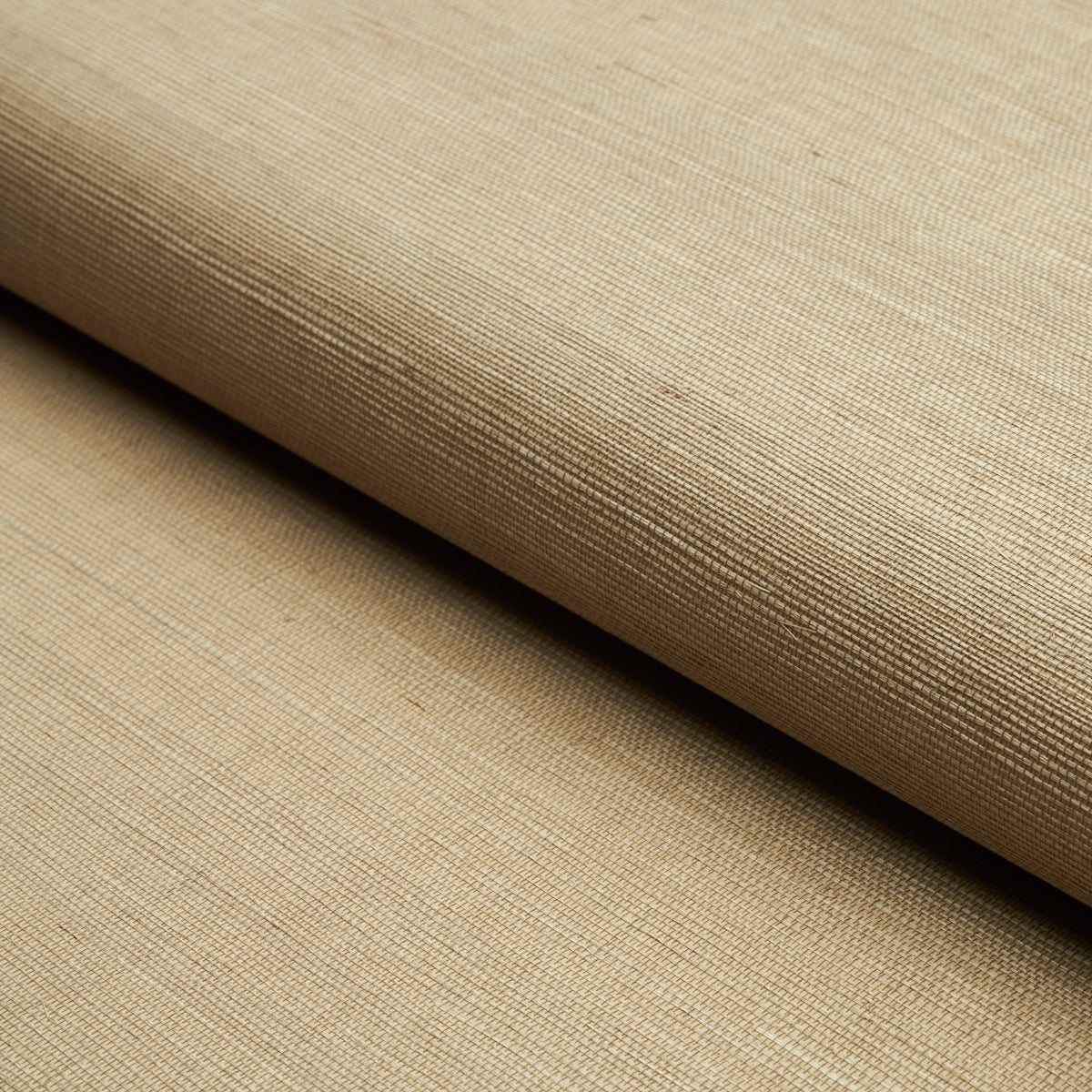 HARUKI SISAL Driftwood textured sisal wallcovering by Schumacher in neutral tones, shown in roll and color assortment.