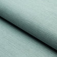 Close-up of Haruki Sisal wallpaper in Robin's Egg blue by Schumacher, showing its textured, woven surface.