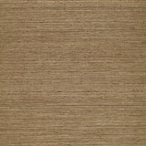 Haruki Sisal Sepia textured wallcovering by Schumacher, shown in a close-up and styled in a modern interior.