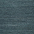 Haruki Sisal Peacock textured wallcovering by Schumacher, shown in close-up and styled in a modern interior.