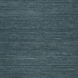 Haruki Sisal Peacock textured wallcovering by Schumacher, shown in close-up and styled in a modern interior.