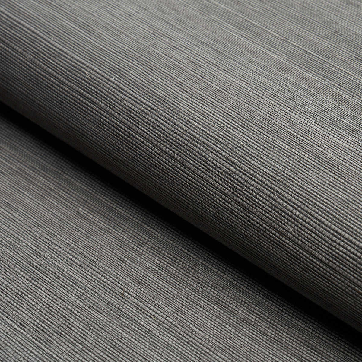 HARUKI SISAL Charcoal textured sisal wallcovering by Schumacher, shown in close-up and styled interior settings.