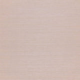 Haruki Sisal mauve textured wallpaper by Schumacher shown in close-up and installed in a modern room setting.