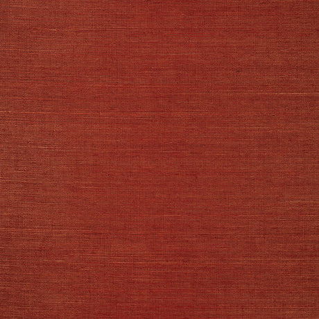 Haruki Sisal Garnet wallcovering by Schumacher, textured red sisal wallpaper sample and styled interior view.