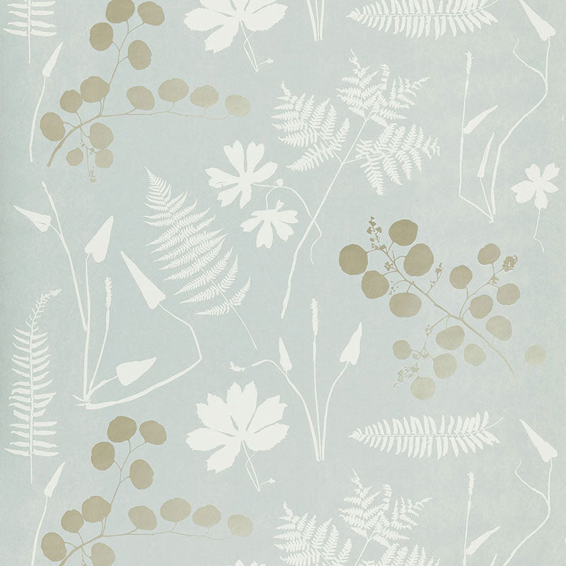 Modern Botanical wallpaper in Slate by Schumacher featuring hand-screened botanical silhouettes in neutral and white on a soft blue background.