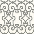 Manor Gate wallpaper in charcoal by Schumacher featuring a bold, modern scrollwork pattern in grey on a white background.
