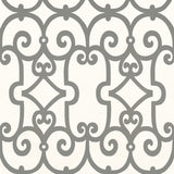 Manor Gate wallpaper in charcoal by Schumacher featuring a bold, modern scrollwork pattern in grey on a white background.