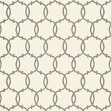 Tracery Charcoal by Schumacher - Modern geometric trellis wallpaper in charcoal and white, shown in styled interior spaces.