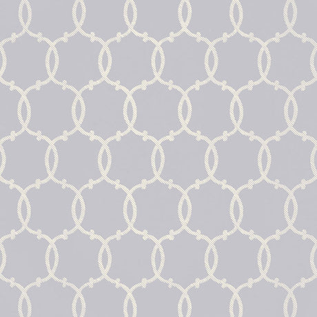 Tracery wallpaper in Wisteria by Schumacher, featuring a rope lattice geometric pattern in soft lavender and white.