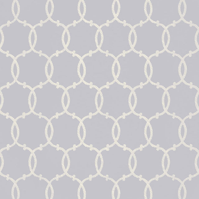 Tracery wallpaper in Wisteria by Schumacher, featuring a rope lattice geometric pattern in soft lavender and white.