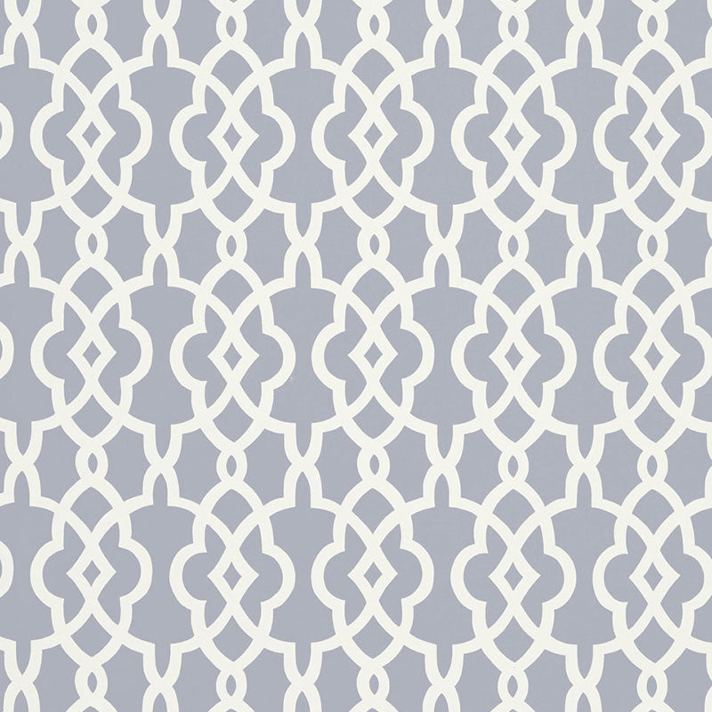 Summer Palace Fret wallpaper in Wisteria by Schumacher, featuring a modern geometric fretwork pattern in soft lavender and white.