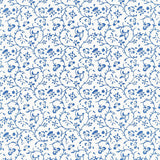 Kyara Vine Delft blue and white hand screen printed wallpaper by Schumacher, Jaipur Collection, floral vine pattern.