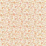 Kyara Vine wallpaper in Valencia by Schumacher, Jaipur Collection. Orange vine and floral block print on cream background.