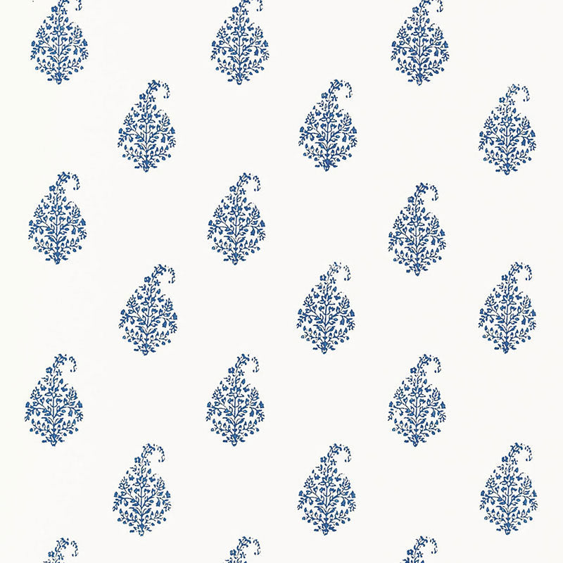 Kerala Paisley Delft blue and white paisley wallpaper by Schumacher shown in a living room interior and as a pattern close-up.