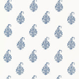 Kerala Paisley Delft blue and white paisley wallpaper by Schumacher shown in a living room interior and as a pattern close-up.
