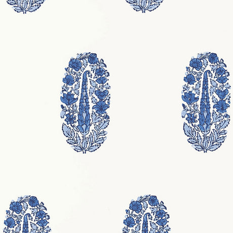 ASKANDRA FLOWER Delft blue paisley floral wallpaper by Schumacher, shown in a bathroom and bedroom interior.