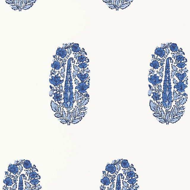 ASKANDRA FLOWER Delft blue paisley floral wallpaper by Schumacher, shown in a bathroom and bedroom interior.