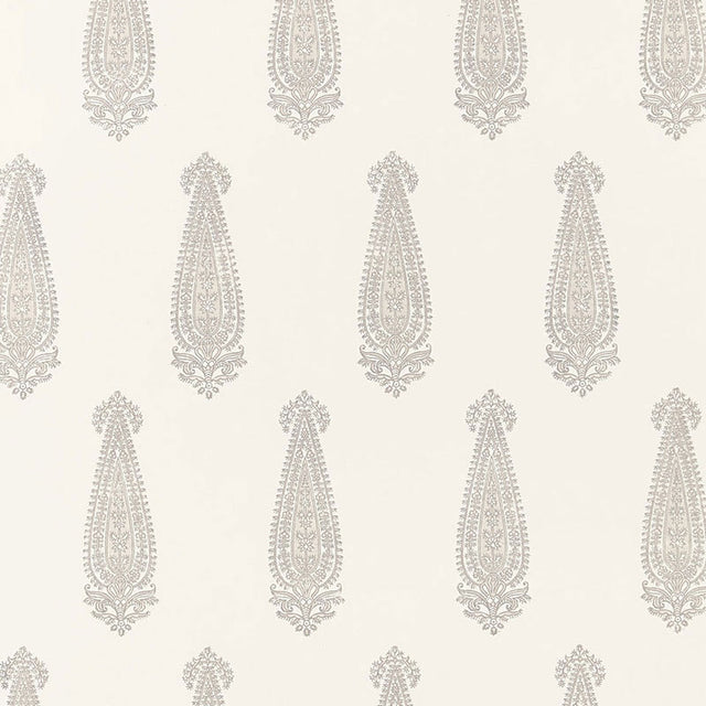 Katara Paisley wallpaper in Oyster by Schumacher, featuring a classic elongated paisley motif with lace-like detail.