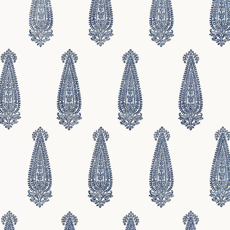 Katara Paisley Delft blue and white paisley wallpaper by Schumacher, shown in a styled interior and pattern close-up.