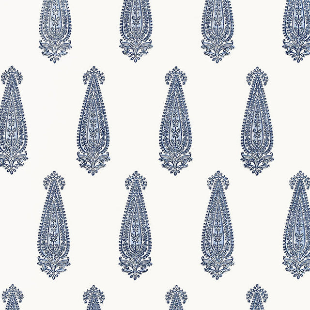 Katara Paisley Delft blue and white paisley wallpaper by Schumacher, shown in a styled interior and pattern close-up.