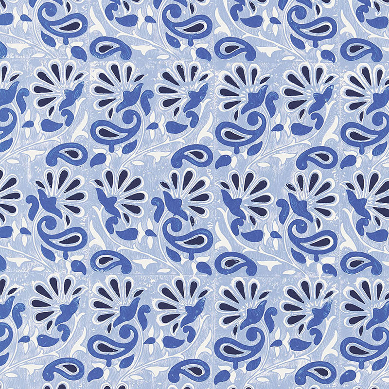 Rampura Delft blue and white hand screen printed wallpaper with floral and paisley motifs by Schumacher.
