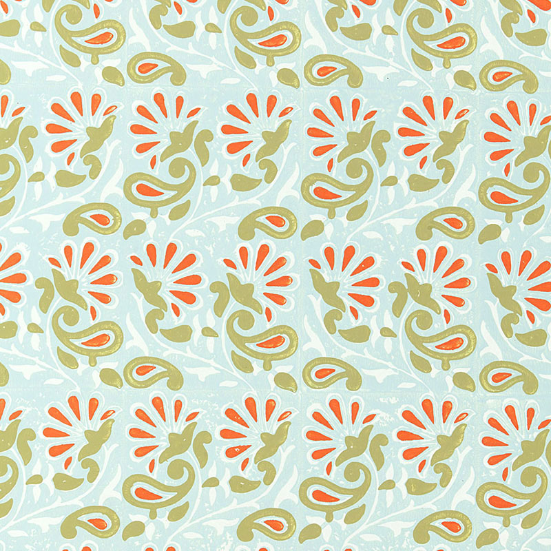 Rampura Water Blue wallpaper by Schumacher, hand screen printed with a stylized floral and paisley pattern in blue, green, and orange.