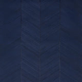 Chevron Texture wallpaper in Midnight Blue by Schumacher, featuring raised diagonal stripes forming a herringbone pattern with a metallic luster.