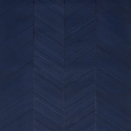Chevron Texture wallpaper in Midnight Blue by Schumacher, featuring raised diagonal stripes forming a herringbone pattern with a metallic luster.