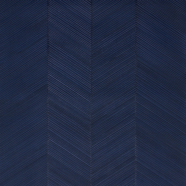 Chevron Texture wallpaper in Midnight Blue by Schumacher, featuring raised diagonal stripes forming a herringbone pattern with a metallic luster.
