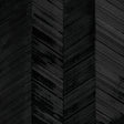 Chevron Texture Onyx wallcovering with raised diagonal stripes in a wide herringbone pattern and metallic luster by Schumacher.