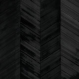 Chevron Texture Onyx wallcovering with raised diagonal stripes in a wide herringbone pattern and metallic luster by Schumacher.