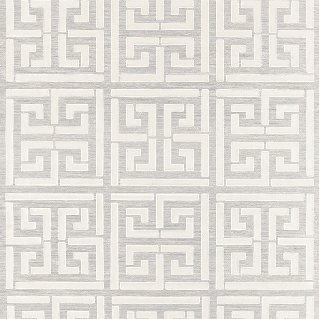 Greek Key Sisal wallpaper in silver, a handcrafted wallcovering with a classic Greek key pattern on natural sisal.