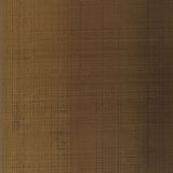Brushed Plaid wallpaper in Burnished Bronze by Schumacher, featuring a hand-combed plaid effect with metallic pigments.