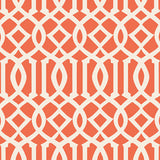 Imperial Trellis II wallpaper in Ivory and Mandarin by Kelly Wearstler for Schumacher, featuring a bold geometric trellis pattern in orange and ivory.