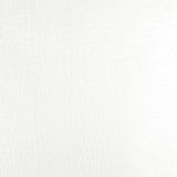 White crocodile-embossed luxury wallpaper by Schumacher, shown in close-up and in a roll with other colorways.