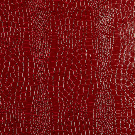Crimson red crocodile embossed wallpaper with a luxurious, textured finish by Schumacher.