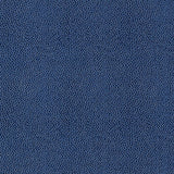 Shagreen Ultramarine faux embossed pebbled texture wallpaper by Schumacher, blue colorway, close-up and roll view.